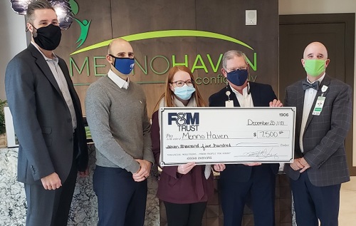 bank reps present $7,500 check to Menno Haven reps